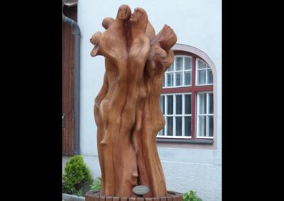 Sbg - Salzburg - Bezirk St. Peter, Holzskulptur die Gemeinschaft